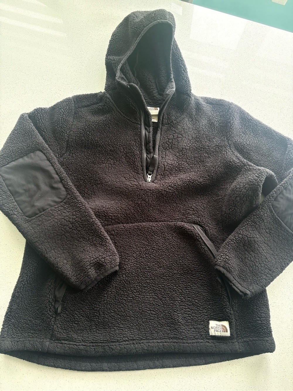 The North Face womanβs Black Fleece Hooded Pullover